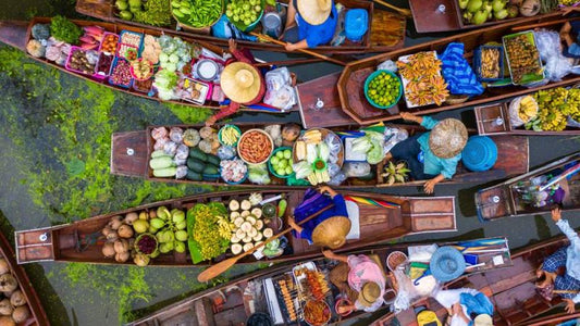 Bangkok Risky Train and Damnoen Saduak Floating Market Half-Day Tour