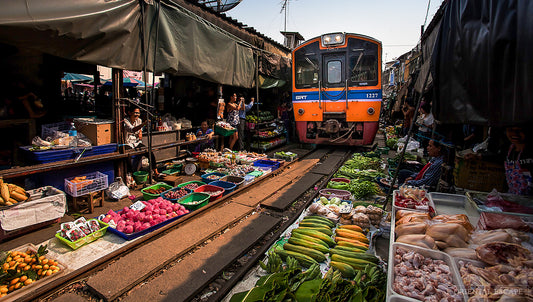 Bangkok Risky Train and Damnoen Saduak Floating Market Half-Day Tour